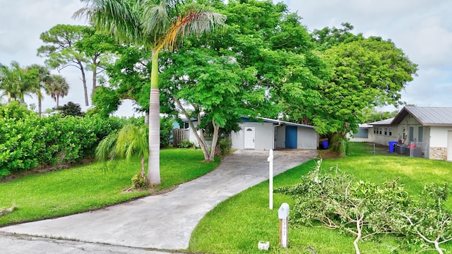 view of front of home with a front lawn