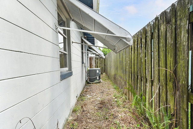 view of home's exterior featuring central air condition unit