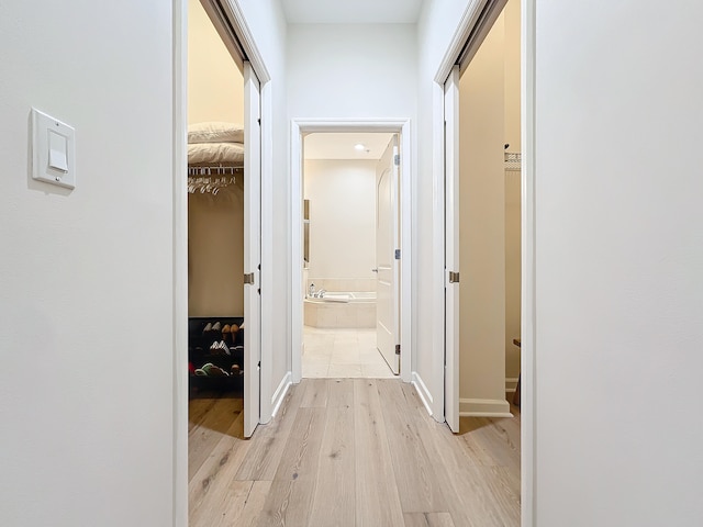 hall featuring light wood-type flooring