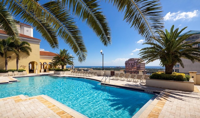 view of swimming pool featuring a patio