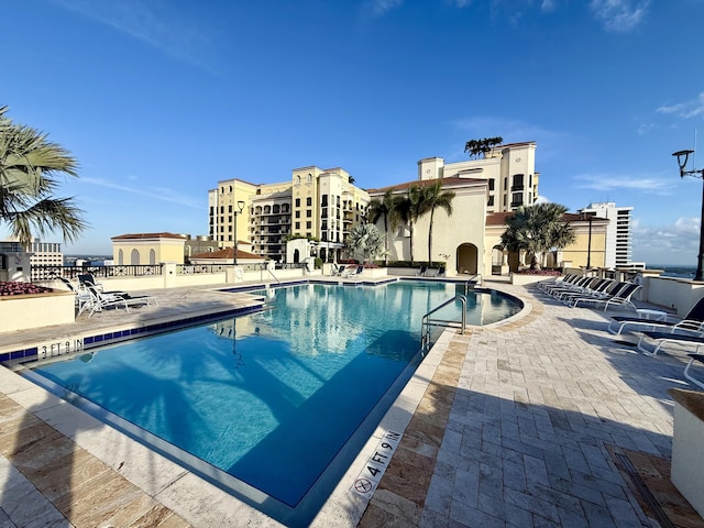 pool with a patio