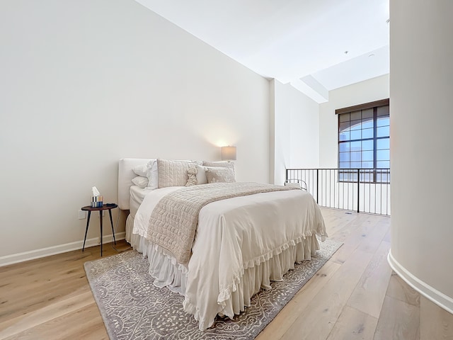 bedroom with light wood-type flooring