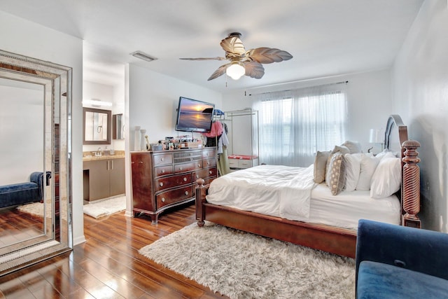 living room featuring light tile patterned flooring and ceiling fan with notable chandelier