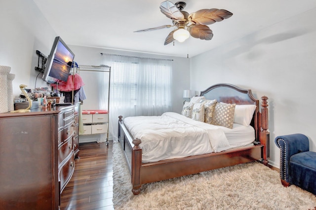 tiled living room with ceiling fan