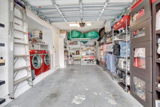 garage featuring a garage door opener and washing machine and dryer