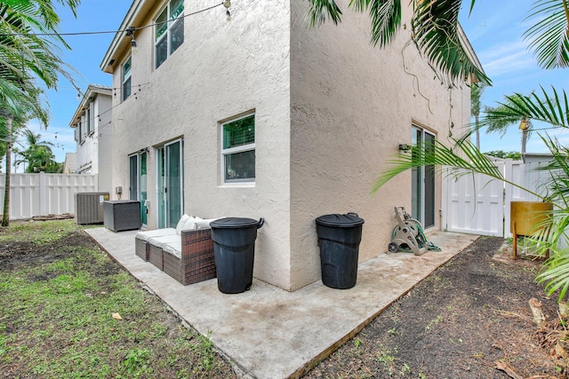 rear view of house with a patio