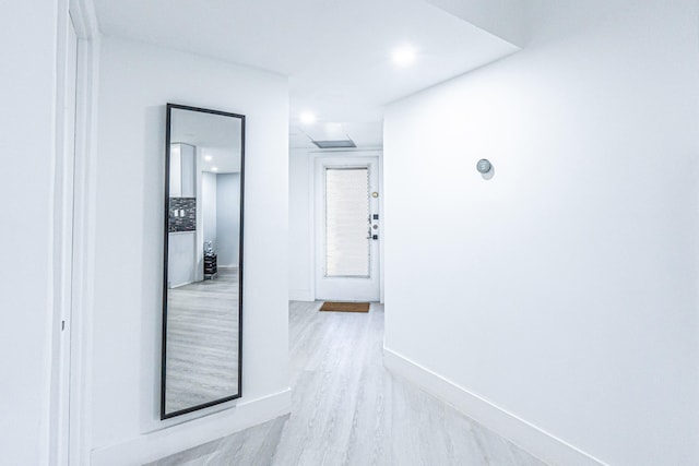 hallway featuring light wood-type flooring