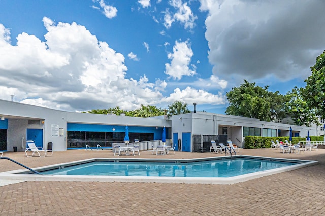 view of swimming pool featuring a patio