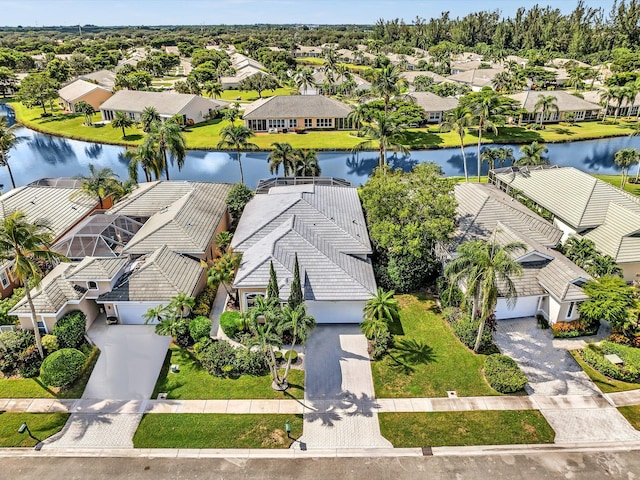 bird's eye view with a water view