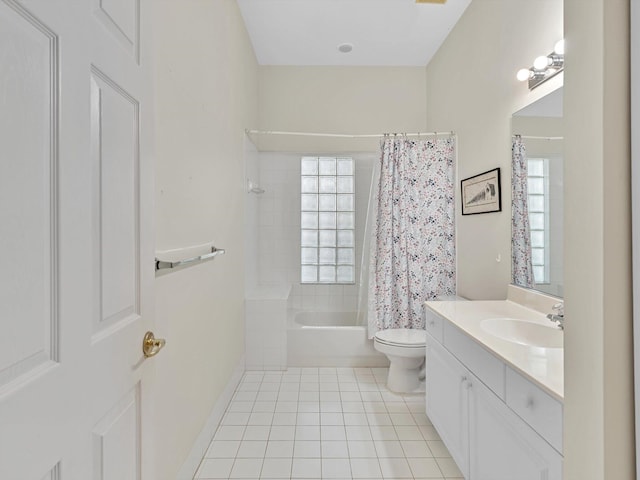 full bathroom with shower / bath combination with curtain, vanity, tile patterned flooring, and toilet