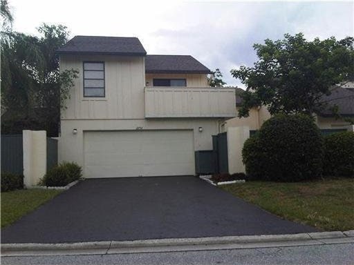 view of property with a garage