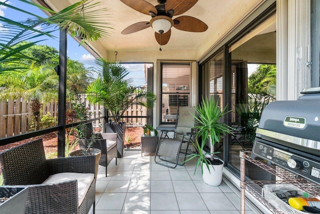 sunroom / solarium with ceiling fan