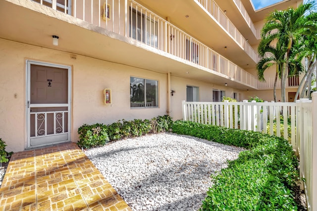 property entrance with a balcony