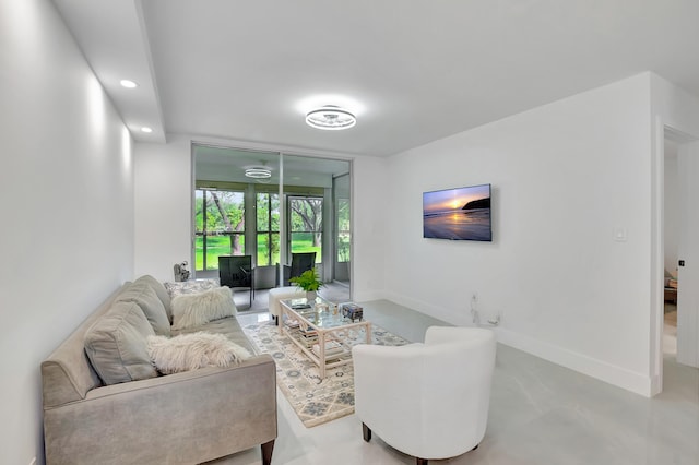 living room with concrete flooring