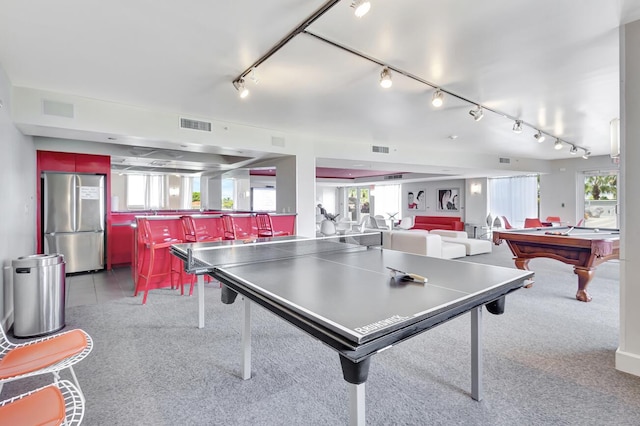 game room with light carpet, billiards, plenty of natural light, and track lighting