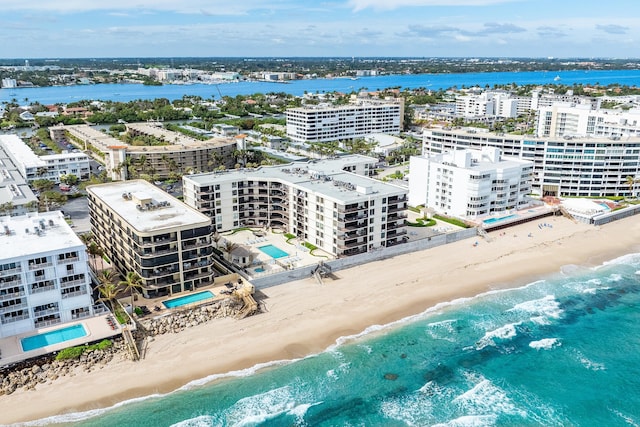 aerial view with a beach view and a water view