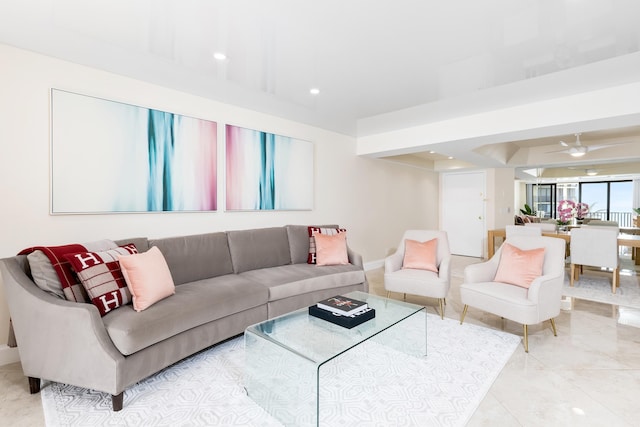 living room with ceiling fan and light tile patterned floors