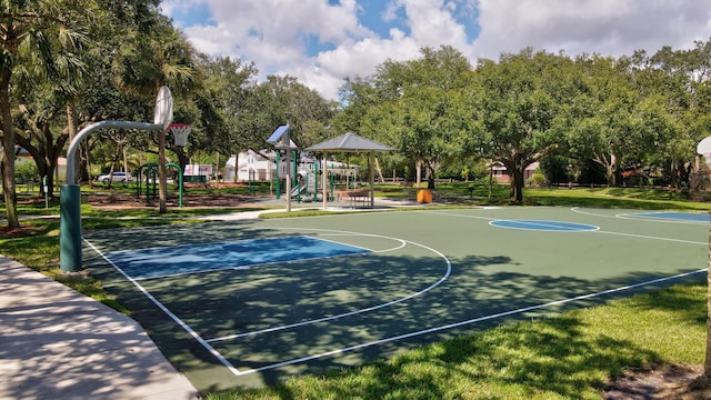 view of sport court featuring a playground