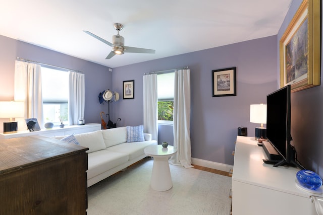 living room featuring ceiling fan