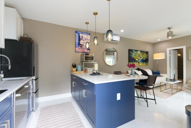 kitchen with white cabinets, dishwasher, a breakfast bar area, and kitchen peninsula