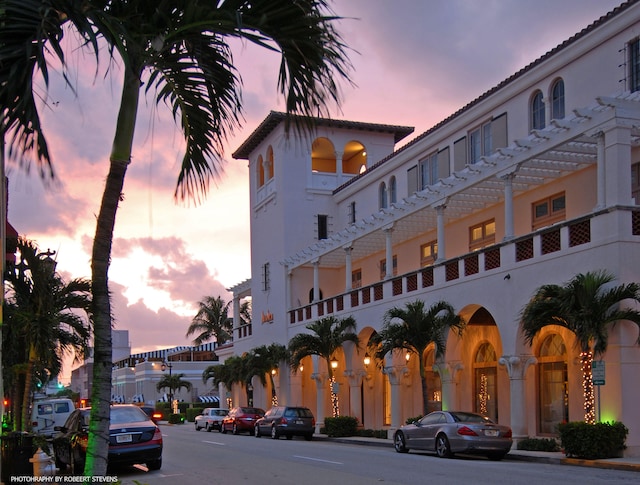 view of outdoor building at dusk