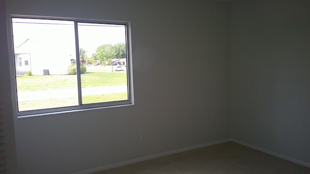 empty room featuring tile patterned flooring