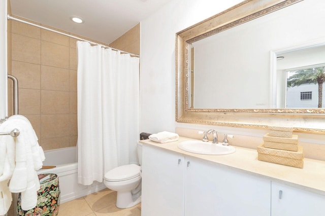 full bathroom featuring tile patterned floors, shower / bath combo, vanity, and toilet