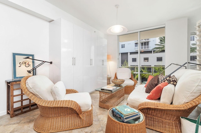 living room with a wall of windows