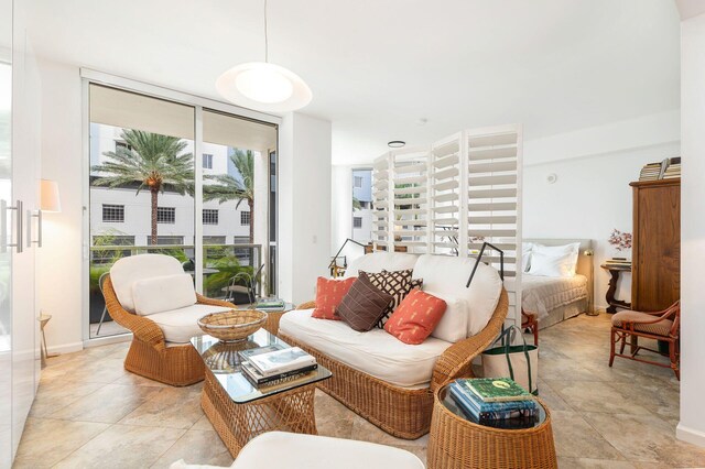 tiled living room with a healthy amount of sunlight