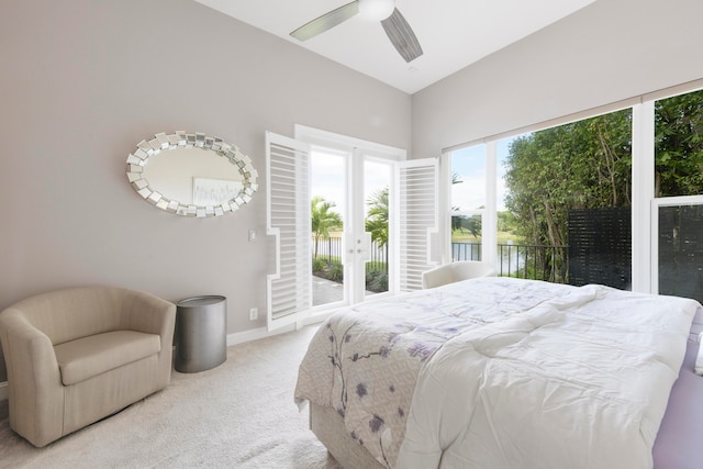 carpeted bedroom with ceiling fan and access to exterior