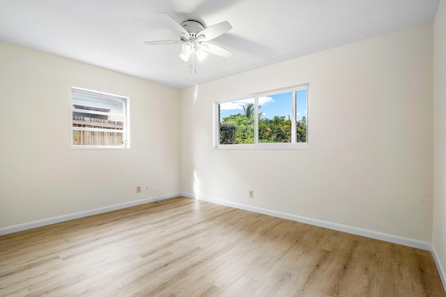 unfurnished room with light hardwood / wood-style flooring and ceiling fan