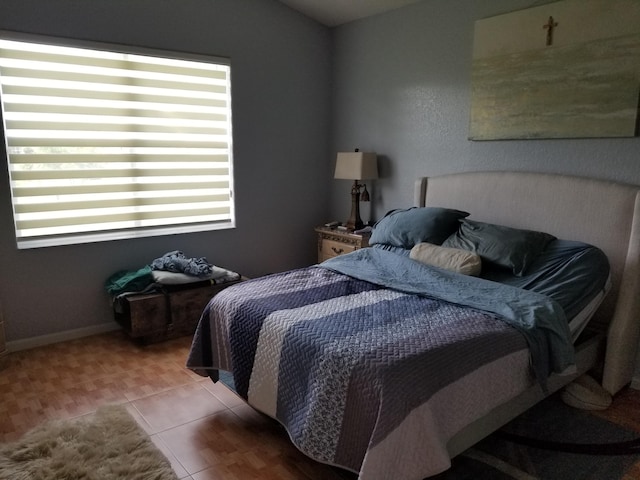 bedroom with tile patterned flooring