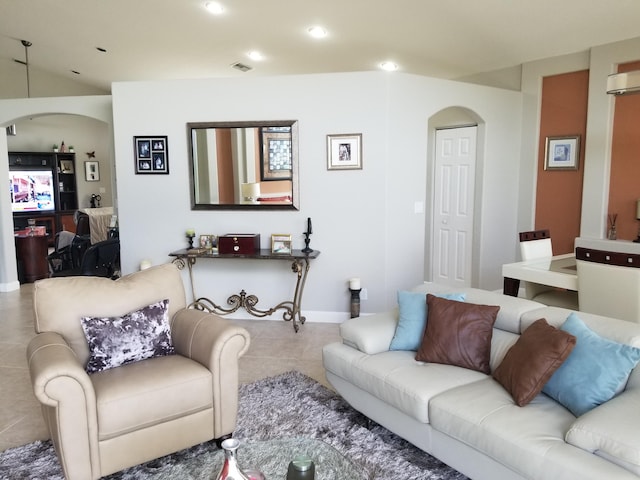 living room with tile patterned flooring