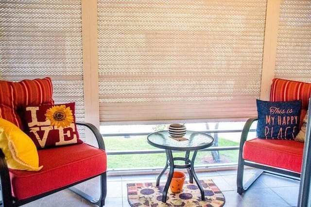 sitting room with tile patterned flooring