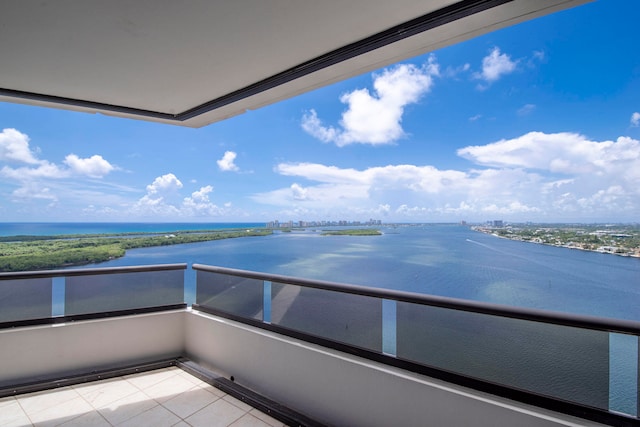 balcony featuring a water view