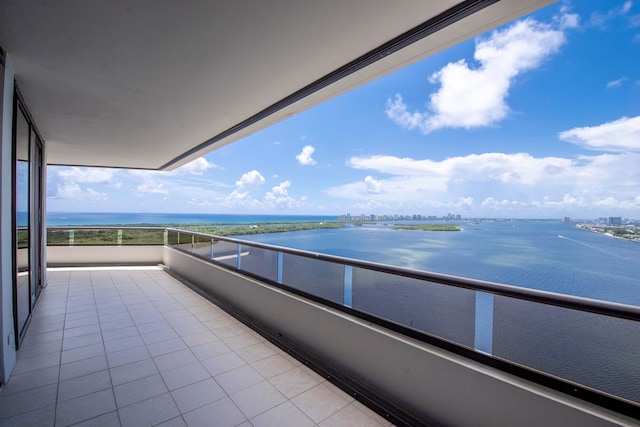 balcony featuring a water view