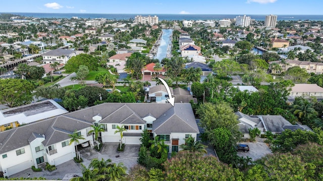 drone / aerial view featuring a water view