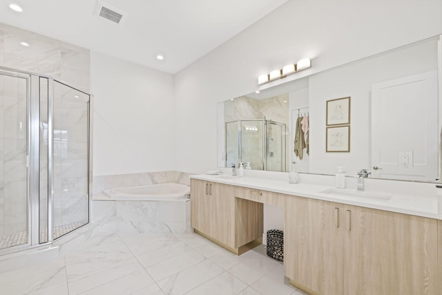 bathroom featuring vanity and plus walk in shower