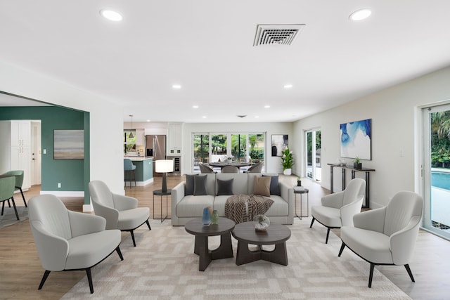 living room featuring light hardwood / wood-style floors