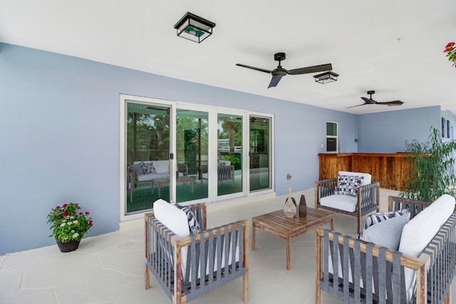 view of patio featuring outdoor lounge area and ceiling fan