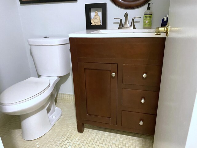 270 Tilford M, Deerfield Beach, FL 33442 - bathroom featuring toilet, vanity, and tile patterned floors