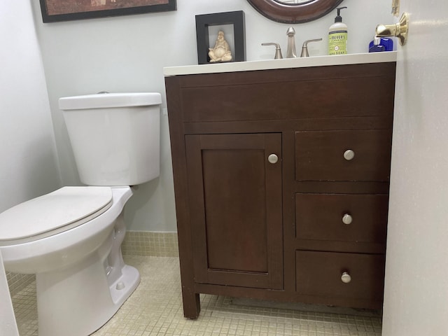 270 Tilford M, Deerfield Beach, FL 33442 - bathroom with vanity, toilet, and tile patterned flooring