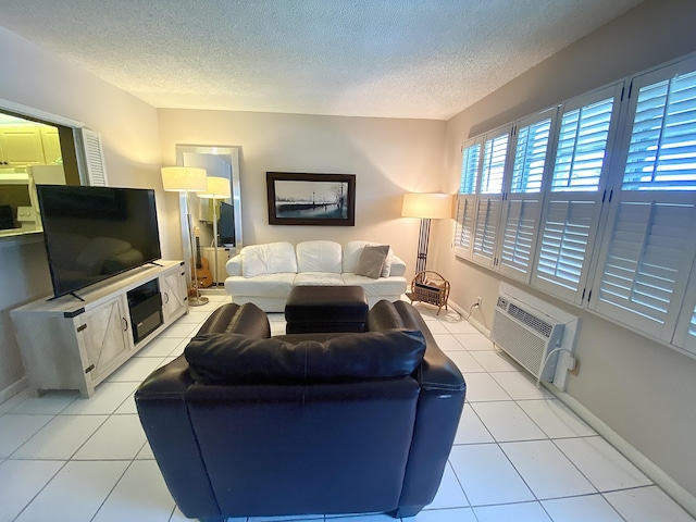 270 Tilford M, Deerfield Beach, FL 33442 - living area featuring a wall mounted air conditioner, light tile patterned floors, a textured ceiling, and baseboards