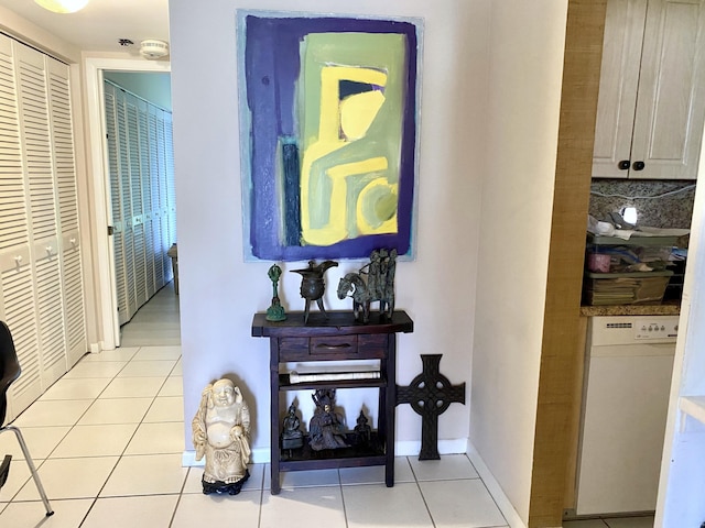 270 Tilford M, Deerfield Beach, FL 33442 - hall featuring light tile patterned floors and baseboards