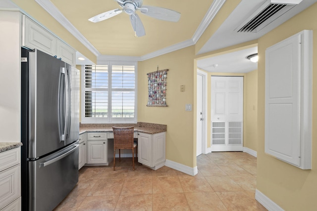 kitchen featuring light tile patterned flooring, white cabinetry, stainless steel refrigerator, crown molding, and ceiling fan