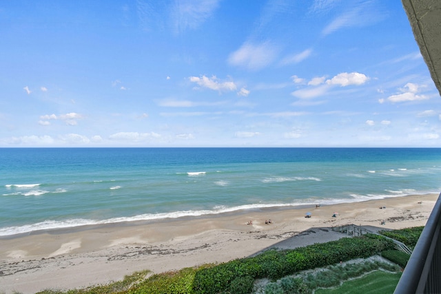 view of water feature with a beach view