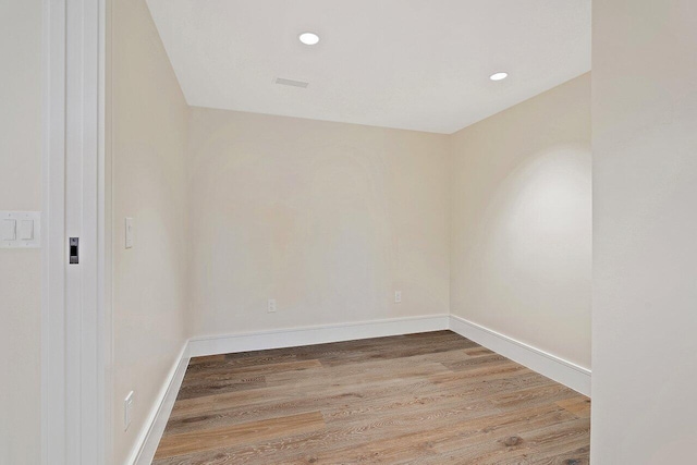 empty room with light wood-type flooring