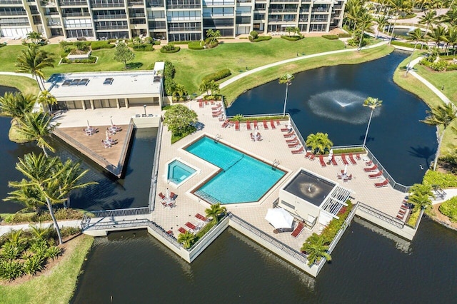 bird's eye view with a water view