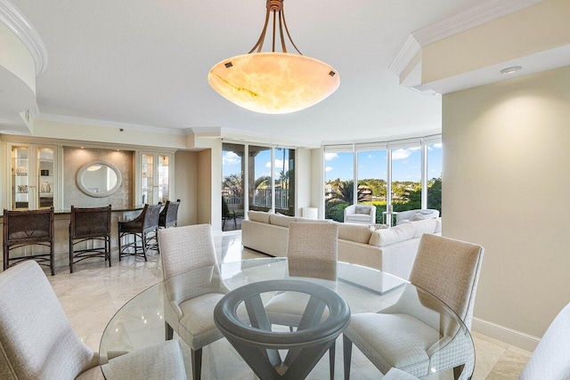 dining room with ornamental molding