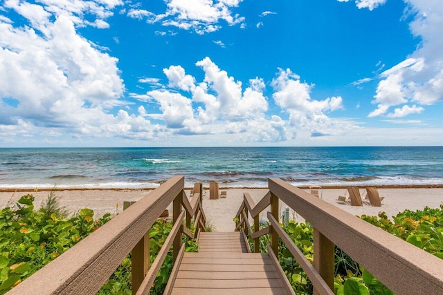 property view of water featuring a beach view